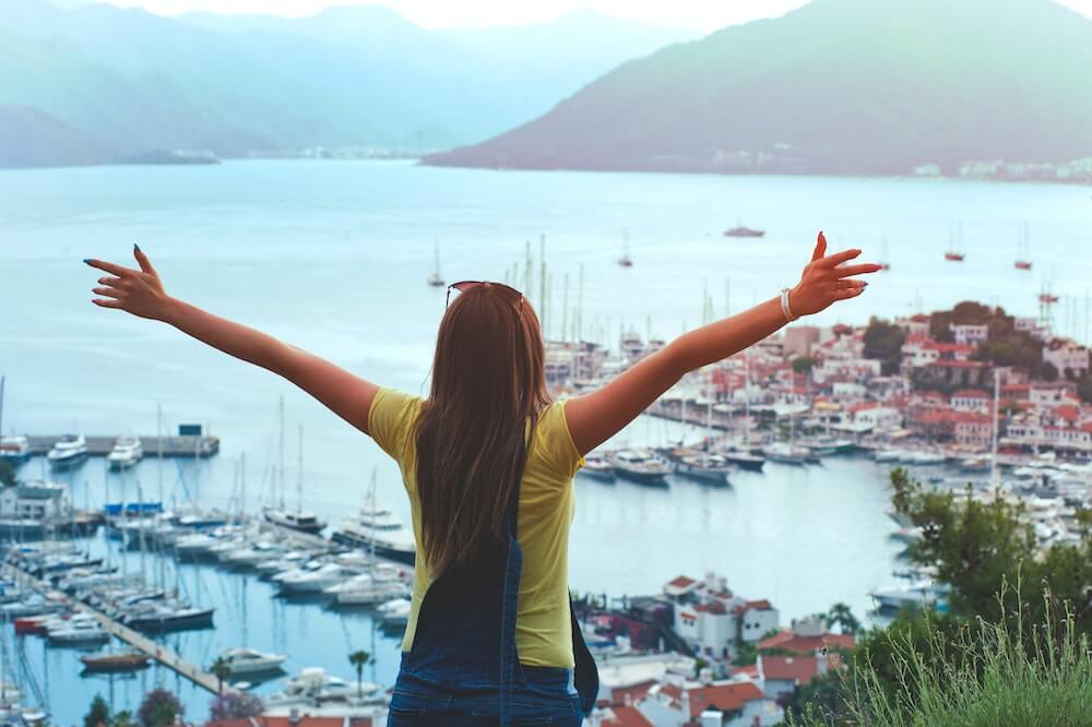 abundance-mindset-woman-outstretched-arms