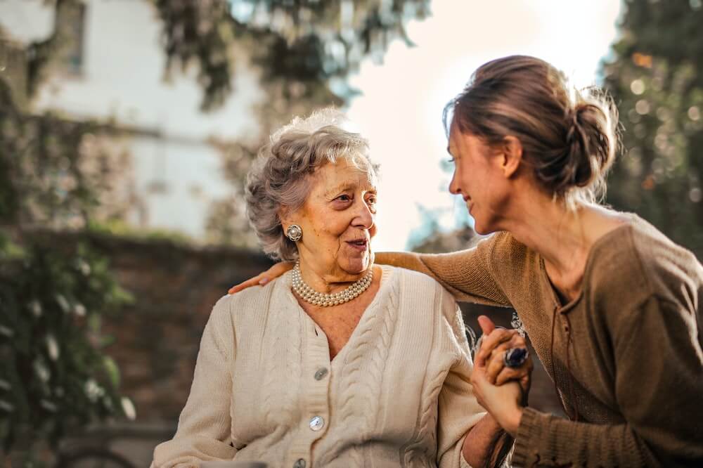 woman-caring-elderly-abundance-mindset