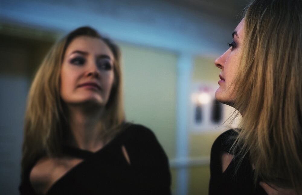 woman-self-reflection-manifestation-methods