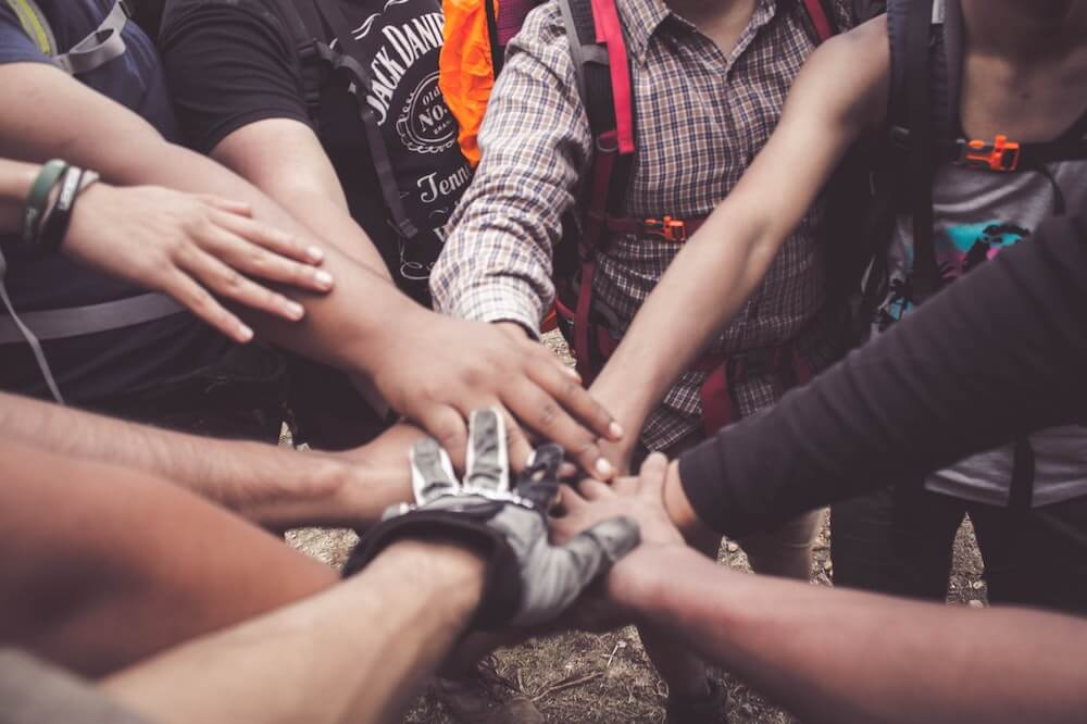 People-Doing-Group-Hand-Cheer
