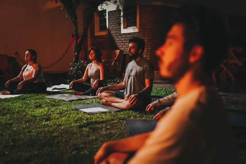 People-outdoor-yoga-silent-retreat