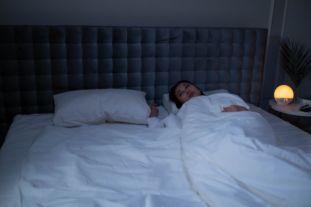Sleepless-Woman-Lying-in-Bed
