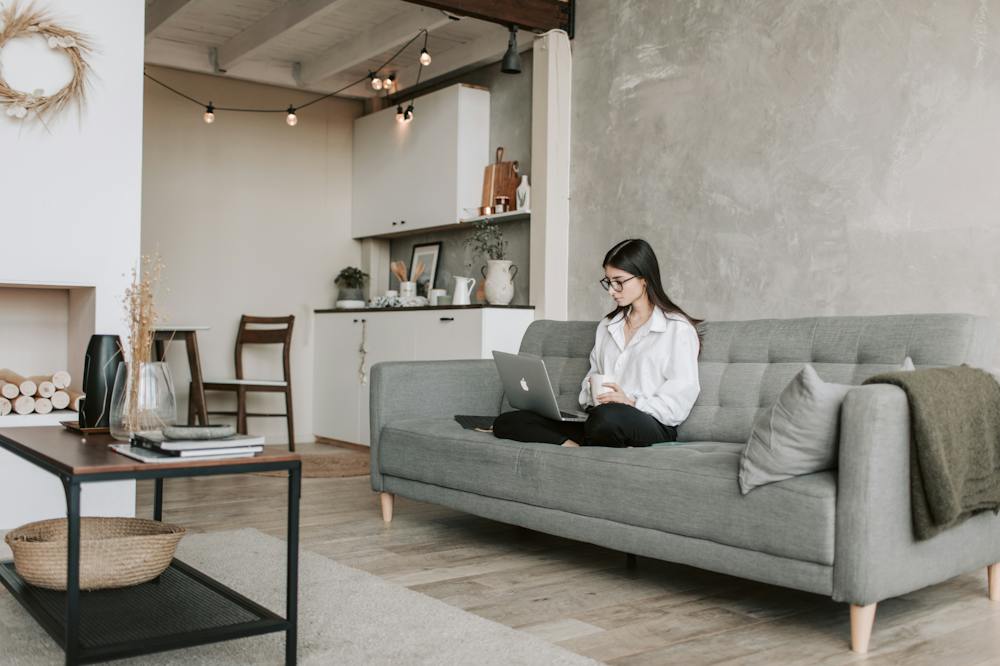 Minimalist-lifestyle-Woman-On-Sofa