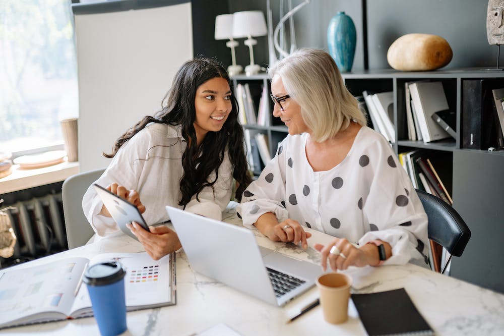 Happy-people-discussing-work-project