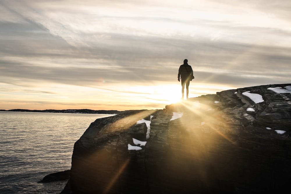 Rules-of-life-man-on-cliff