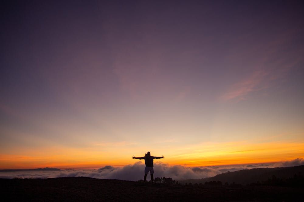 Silhouette-of-Man-arms-spread