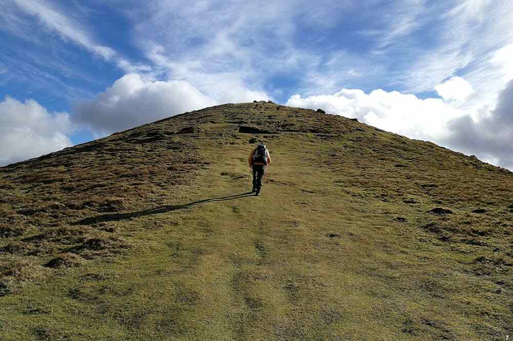 Man-Climbing-Hill-Next-Level