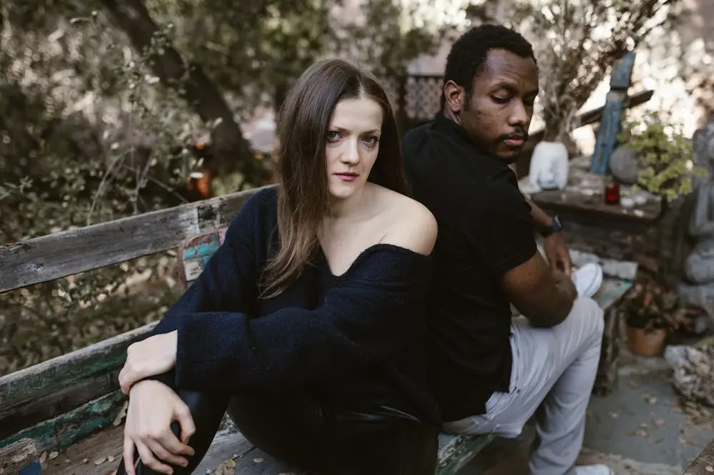 The Dark Side of Love: 10 Signs of Gaslighting You Need to Know 1 Gaslighting-man-woman-sitting-bench