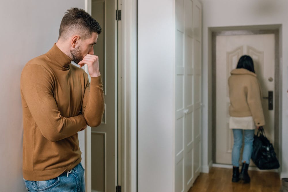 7 Easy Ways to Turn a Situationship into an Awesome Relationship 7 Woman-Walking-Out-of-apartment