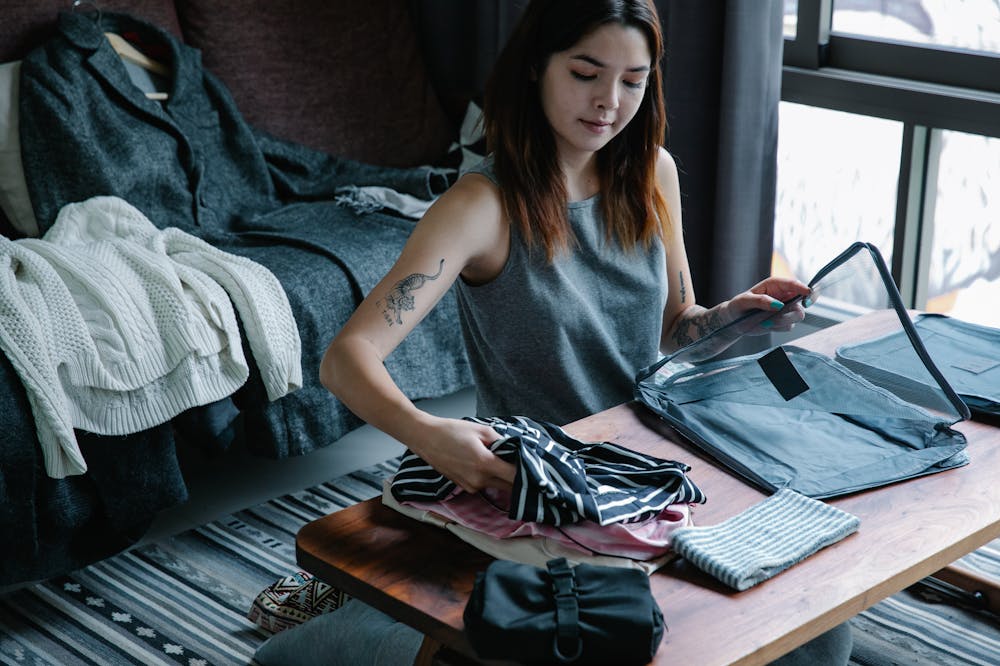 Mental-Clarity-woman-packing-clothes