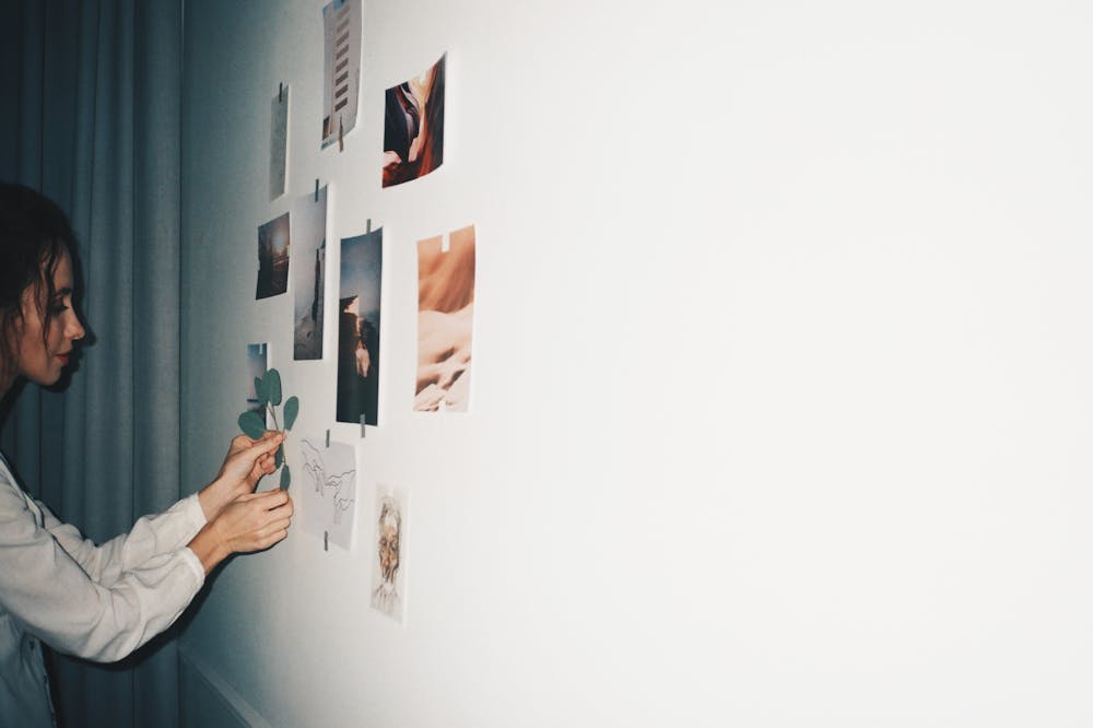 Woman-Looking-At-Vision-Board