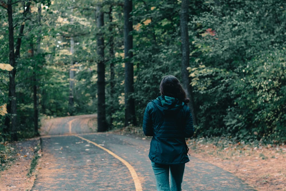 Woman-Walking-In-A-Park
