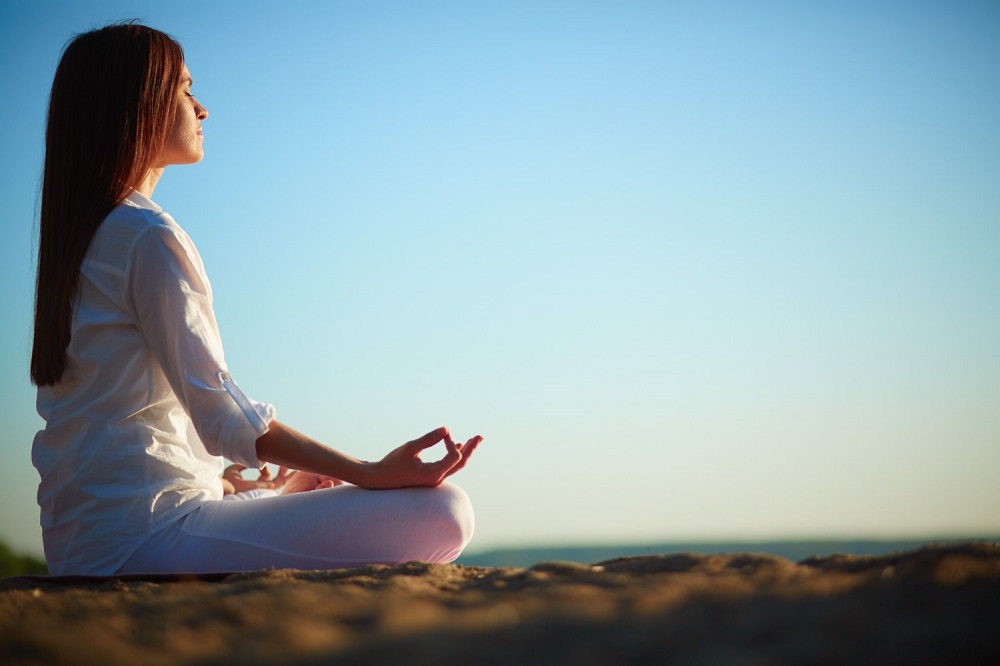 woman-meditating-lotus-position