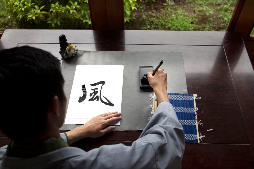 5 Ancient Lessons on How to Build Discipline for a Happy & Successful Life 1 How-to-build-discipline-Man-practicing-calligraphy