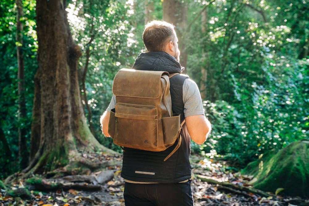 Marcus-Aurelius-man-carrying-backpack-forest