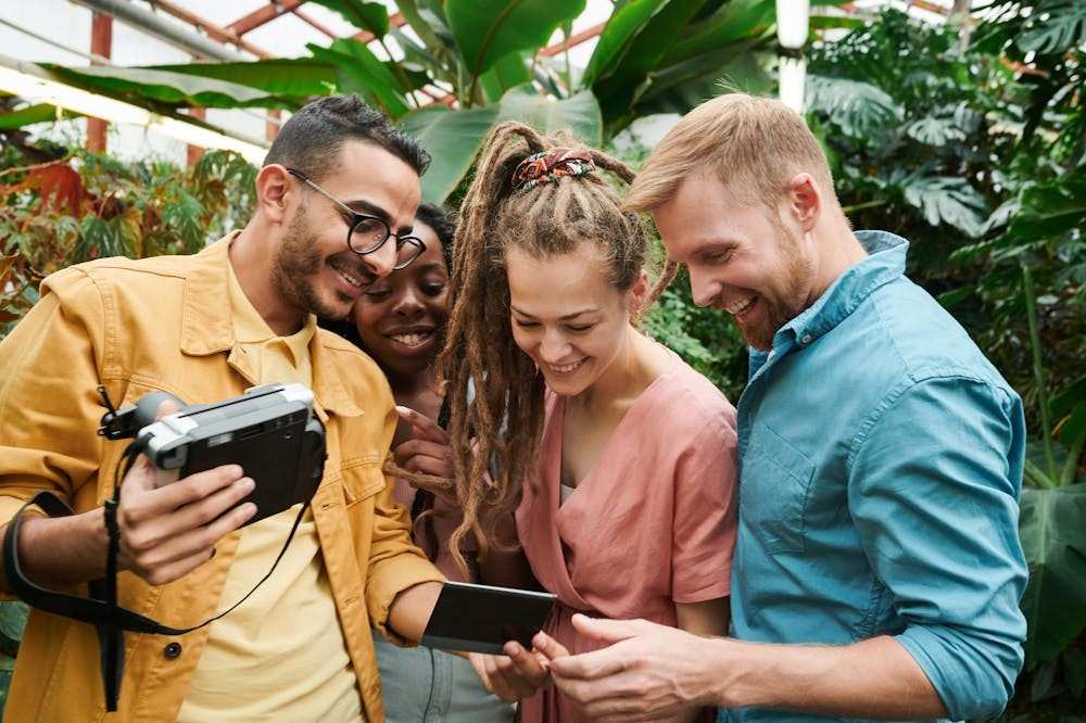 Group-of-people-looking-at-photos