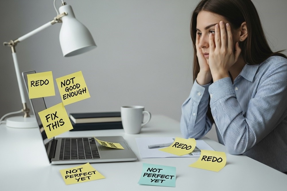 Woman-High-Functioning-anxiety-Looking-At-Laptop