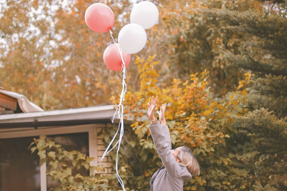 woman-release-balloons-Seize-the-Day