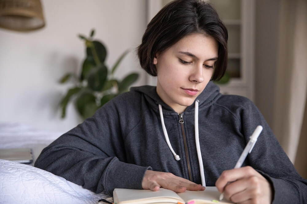 Empower Your Life With These 7 Powerful Self-image Boosters 7 Woman-writing-designing-your-life