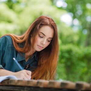 Girl-writing-in-notebook